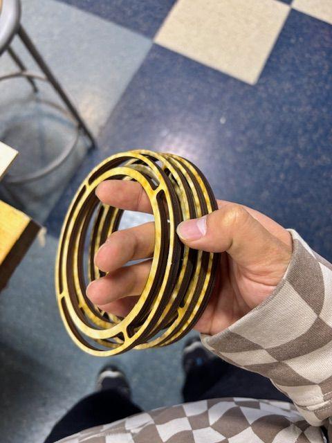 Stack of laser-cut plywood rings